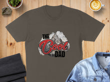 Load image into Gallery viewer, Dark gray t-shirt with "The Cool Dad" text and mountain graphic.
