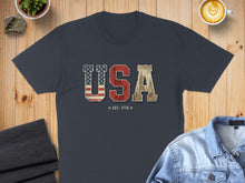 Load image into Gallery viewer, Navy t-shirt with "USA EST. 1776" text and US flag overlay.
