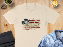 Load image into Gallery viewer, Distressed American flag graphic with "Freedom" text on a tan t-shirt.
