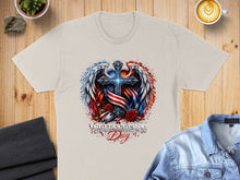 Load image into Gallery viewer, Independence Day graphic on a light t-shirt with American flag, roses, and wings.
