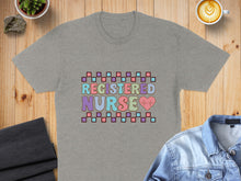 Load image into Gallery viewer, Gray t-shirt with "REGISTERED NURSE" in colorful squares and a heart.
