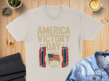 Load image into Gallery viewer, Cream t-shirt with "America Victory Day May 08" and distressed American flag.
