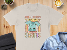 Load image into Gallery viewer, Not all heroes wear capes, some wear scrubs graphic on a t-shirt.
