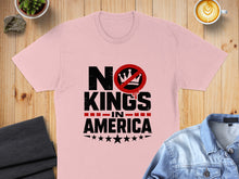 Load image into Gallery viewer, Pink t-shirt with "NO KINGS IN AMERICA" text and a red prohibition sign over a crown.

