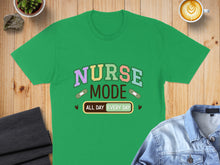 Load image into Gallery viewer, Green t-shirt with "Nurse Mode All Day Every Day" text.
