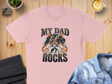 Load image into Gallery viewer, Pink t-shirt with "MY DAD ROCKS" and two crossed guitars.
