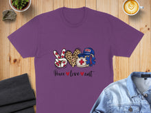 Load image into Gallery viewer, Purple t-shirt with "Peace love ❤ EMT" graphic featuring a peace sign and stethoscope.
