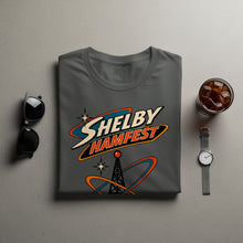 Load image into Gallery viewer, Grey t-shirt with "Shelby Hamfest" graphic featuring a radio tower.
