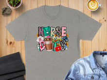 Load image into Gallery viewer, Nurse life graphic on gray t-shirt with coffee cup and sunflowers.

