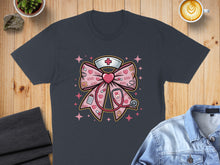 Load image into Gallery viewer, Pink bow with stethoscope, nurse cap, and "XOXO" pattern.
