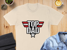 Load image into Gallery viewer, Cream t-shirt with "TOP DAD" text and star design.
