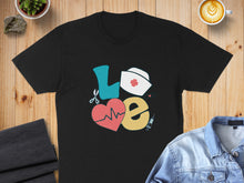 Load image into Gallery viewer, Black t-shirt with "Love" graphic featuring a heart, nurse hat, and syringe.
