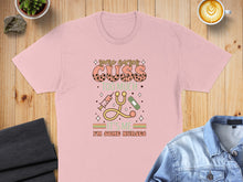 Load image into Gallery viewer, Pink t-shirt with "Some nurses cuss too much, it's me I'm nurses" text and medical icons.
