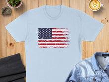 Load image into Gallery viewer, Light blue t-shirt with distressed American flag graphic.
