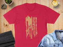 Load image into Gallery viewer, Red t-shirt with distressed flag graphic featuring stars and swords.
