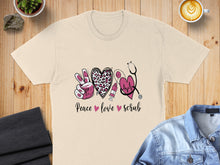 Load image into Gallery viewer, T-shirt with "Peace Love Scrub" text, stethoscope, and syringe.

