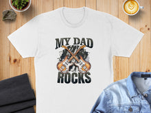 Load image into Gallery viewer, White t-shirt with "MY DAD ROCKS" and crossed electric guitars graphic.
