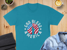 Load image into Gallery viewer, Blue t-shirt with "God Bless America" text and American flag graphic.
