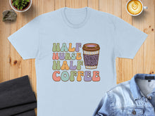 Load image into Gallery viewer, Light blue t-shirt with colorful "Half Nurse Half Coffee" text and coffee cup graphic.
