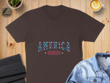 Load image into Gallery viewer, Brown t-shirt with "America Est. 1776" text in a star pattern.
