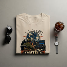 Load image into Gallery viewer, Cream t-shirt with amateur radio graphic featuring globe, antenna, and radio equipment.
