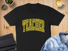 Load image into Gallery viewer, Black t-shirt with "TEACHER" in a yellow and black checkered pattern.
