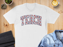 Load image into Gallery viewer, White t-shirt with "TEACH" in floral block lettering, flat lay.
