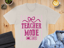 Load image into Gallery viewer, Beige t-shirt with "Teacher Mode OFF" text and pink bow graphic.
