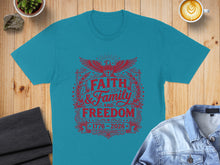 Load image into Gallery viewer, Teal t-shirt with red "Faith, Family, Freedom 1776-2026" graphic.

