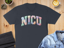Load image into Gallery viewer, Dark blue t-shirt with "NICU" spelled out in a patchwork quilt font.
