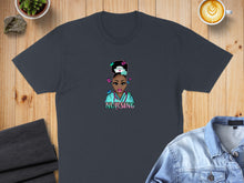 Load image into Gallery viewer, T-shirt featuring cartoon nurse graphic with "NURSING" text.
