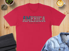 Load image into Gallery viewer, Red t-shirt with "AMERICA EST. 1776" text in a distressed American flag design.
