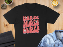 Load image into Gallery viewer, Black t-shirt with pink "Nurse Nurse Nurse" text and small white flowers.
