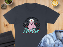 Load image into Gallery viewer, Dark t-shirt with ghost, stars, and "You Can't Scare Me I'm a Nurse" text.
