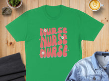Load image into Gallery viewer, Green t-shirt with "Nurse" in pink wavy lettering and small white flowers.
