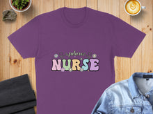 Load image into Gallery viewer, Purple t-shirt with "future NURSE" text in colorful, rounded letters and floral accents.
