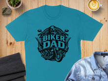 Load image into Gallery viewer, Teal t-shirt with "Biker Dad" text and motorcycle graphic.
