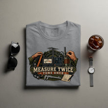 Load image into Gallery viewer, T-shirt graphic with text "Measure Twice Tune Once" and radio equipment.
