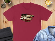 Load image into Gallery viewer, Burgundy t-shirt with "America" text and distressed US flag graphic.

