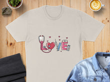 Load image into Gallery viewer, Beige t-shirt with "love" made of stethoscope, syringe, and pills.

