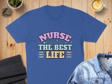 Load image into Gallery viewer, Blue t-shirt with text "Nurse is the best life" and syringe graphics.
