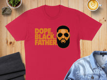 Load image into Gallery viewer, Red t-shirt with black and orange text and illustration of a father.
