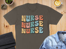 Load image into Gallery viewer, Brown t-shirt with "Nurse Nurse Nurse" text in retro pastel colors.
