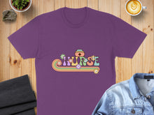 Load image into Gallery viewer, Purple t-shirt with "Nurse" text in retro floral design.
