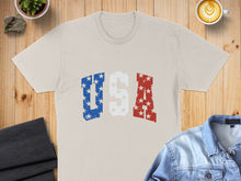 Load image into Gallery viewer, Cream t-shirt with "USA" in distressed red, white, and blue stars and stripes.
