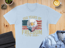 Load image into Gallery viewer, Light blue t-shirt with eagle wearing bandana, "250 Years of Freedom 1776-2026" text.
