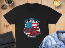 Load image into Gallery viewer, Black t-shirt with Independence Day United States of America shield graphic.
