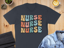 Load image into Gallery viewer, Dark t-shirt with "NURSE" repeated in wavy retro lettering in pastel colors.
