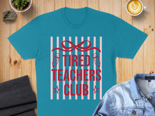 Load image into Gallery viewer, Teal t-shirt with "Tired Teachers Club" text and pencil graphics.
