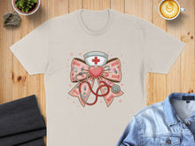 Load image into Gallery viewer, Nurse cap and stethoscope with XO pattern on a tan t-shirt.
